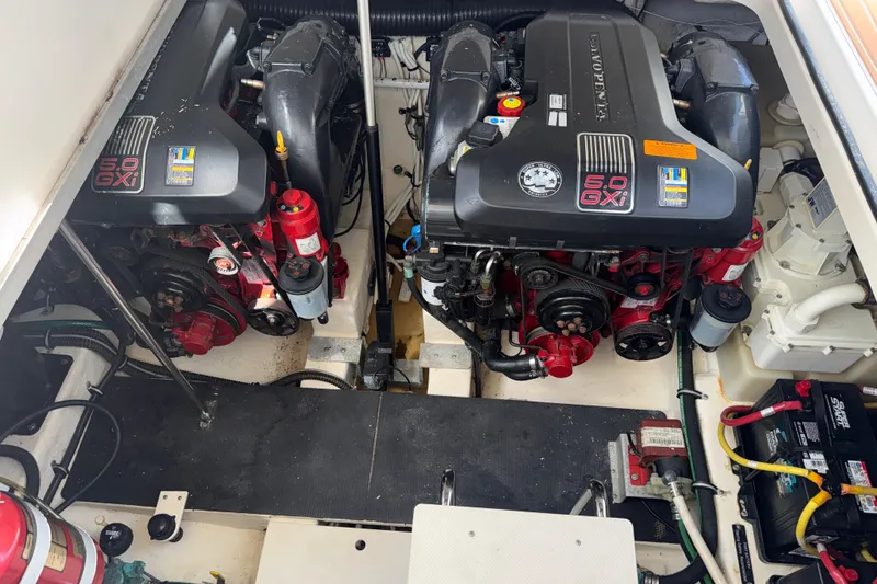 Slide: The Image of Engine compartment of a 2011 Chaparral 310 Signature boat with dual Volvo Penta 5.0 GXI engines. - 49