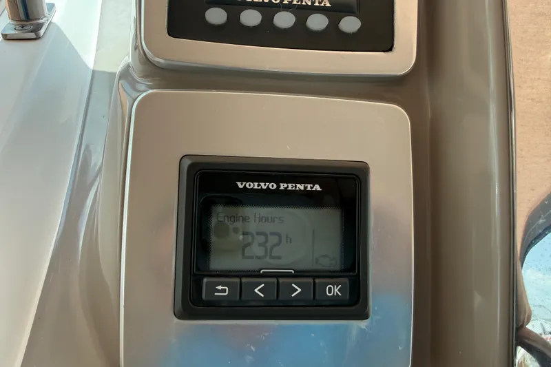Slide: The Image of Volvo Penta engine hour meter displaying 232 hours on a 2011 Chaparral 310 Signature. - 56