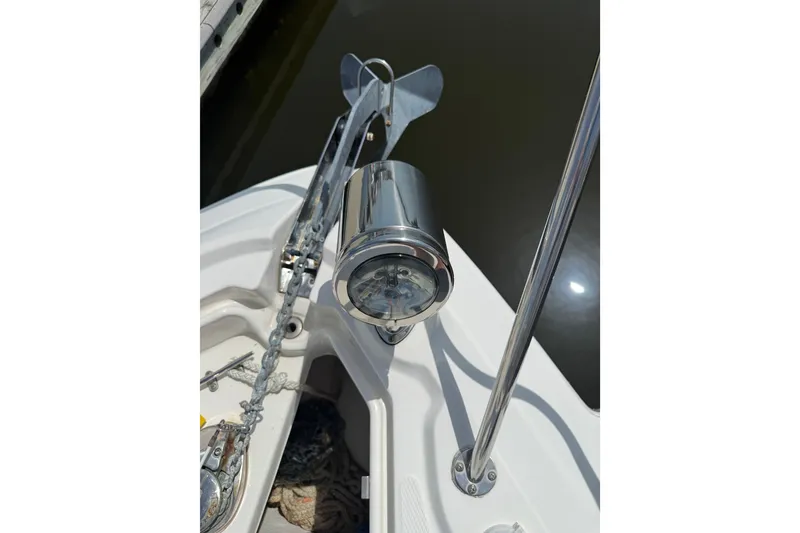 Slide: The Image of Bow of 2011 Chaparral 310 Signature with anchor and stainless steel fittings. - 8