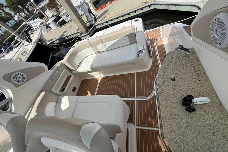 Slide: The Image of Luxurious 2011 Chaparral 310 Signature boat interior with plush seating and elegant design. - 14