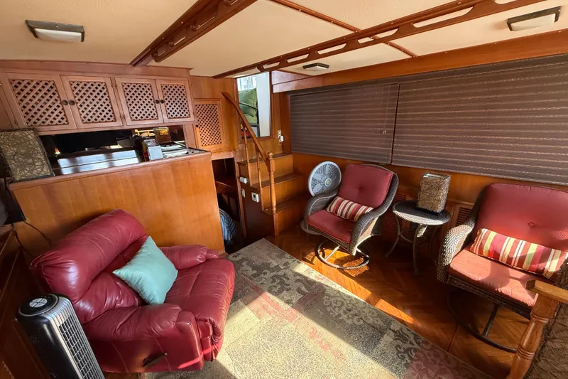 Slide: The Image of Interior of 1989 Heritage East 40 yacht with cozy seating and wooden cabinetry. - 29