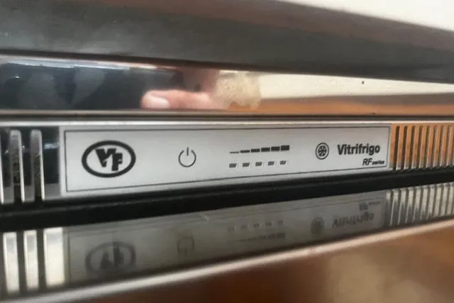 Slide: The Image of Control panel of a Vitifrigo RF series refrigerator on a 1987 Silverton 34 Convertible. - 33