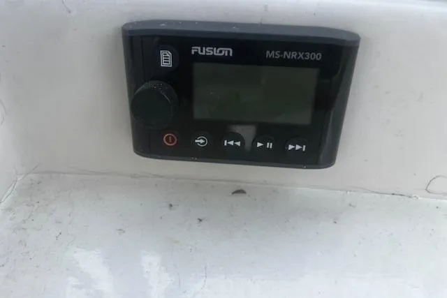 Slide: The Image of Fusion MS-NRX300 marine stereo on 1987 Silverton 34 Convertible boat. - 13