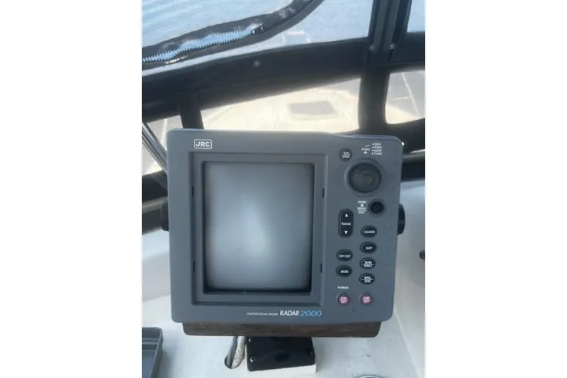 Slide: The Image of JRC Radar 2000 system on 1987 Silverton 34 Convertible boat dashboard. - 12