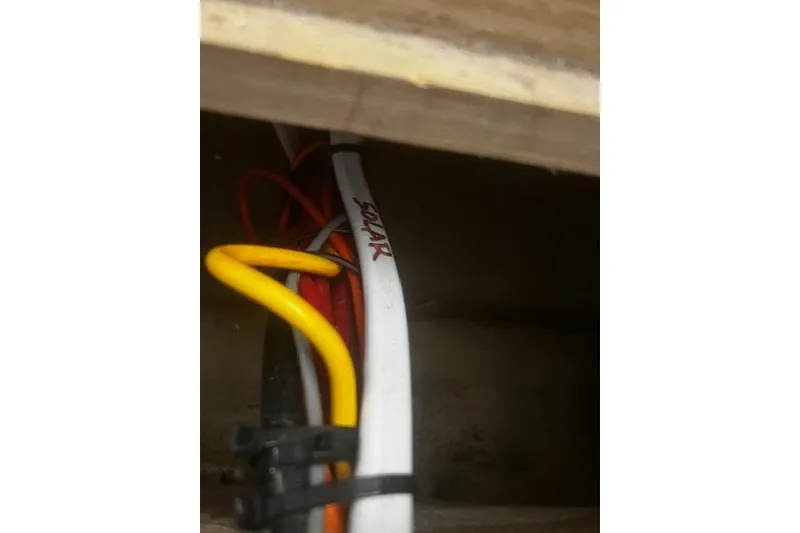 Slide: The Image of Electrical wiring labeled "solar" inside 1987 Silverton 34 Convertible boat. - 39