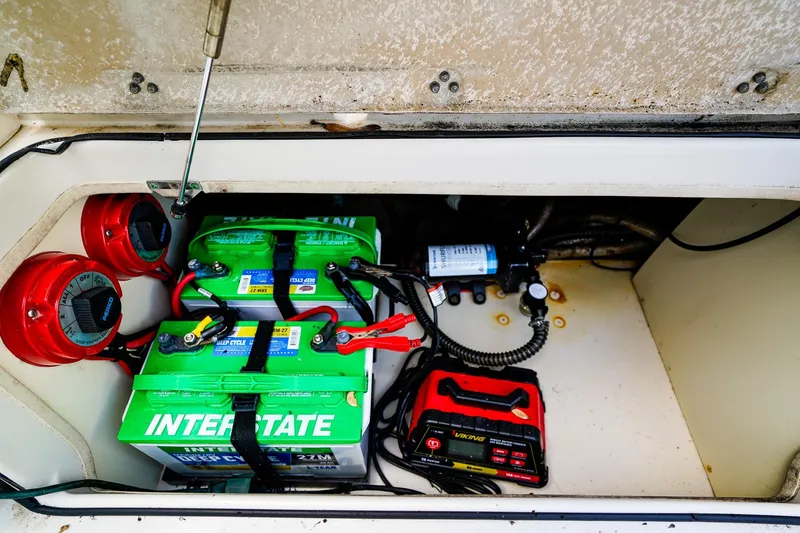 Slide: The Image of Battery compartment of 2018 Sea Chaser 24 HFC with Interstate deep cycle batteries. - 22