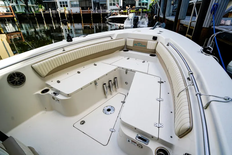 Slide: The Image of 2018 Sea Chaser 24 HFC boat interior with spacious seating and storage compartments. - 18