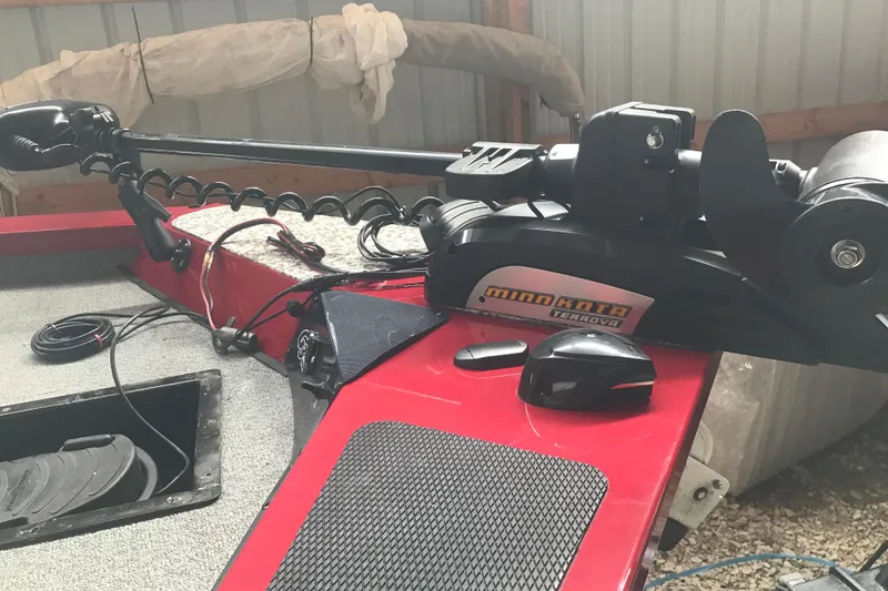 Slide: The Image of 2018 G3 Sportsman 19 boat with Minn Kota Terrova trolling motor on red deck. - 6