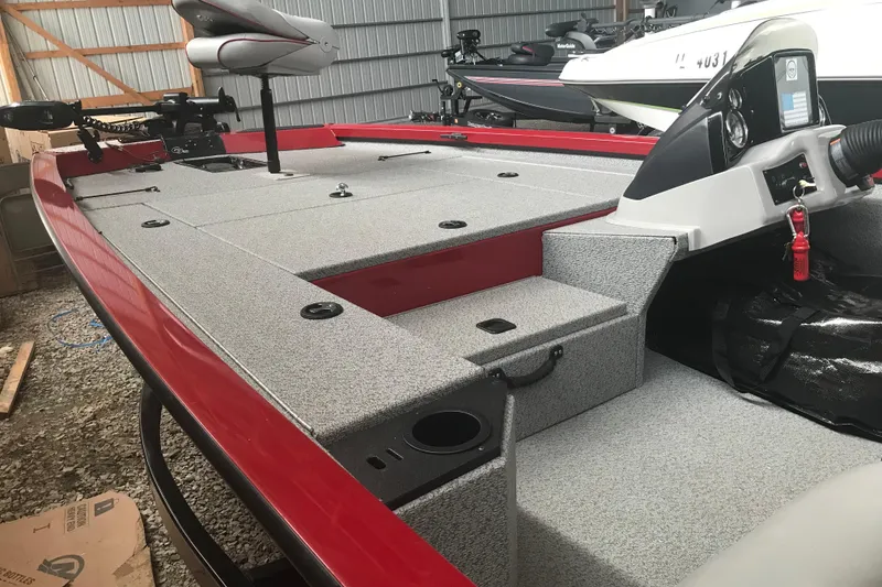 Slide: The Image of 2018 G3 Sportsman 19 boat interior with red accents and fishing equipment. - 10