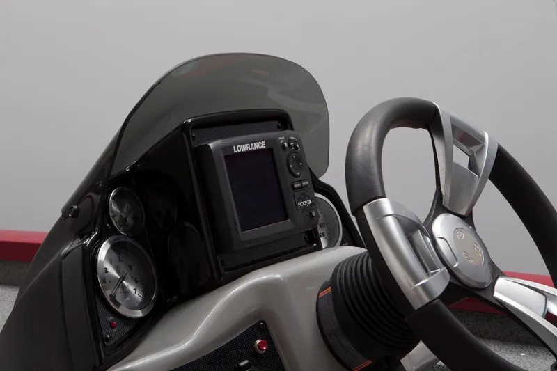 Slide: The Image of Manufacturer Provided Image: 2018 G3 Sportsman 19 boat dashboard with Lowrance fishfinder and steering wheel. - 2