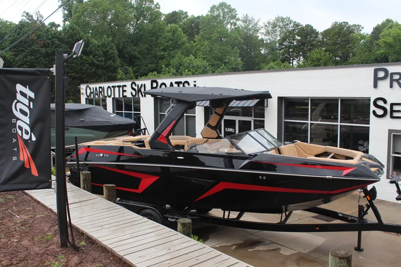 The Image of 2026 Tigé 24RZX boat displayed at Charlotte Ski Boats dealership. - 1