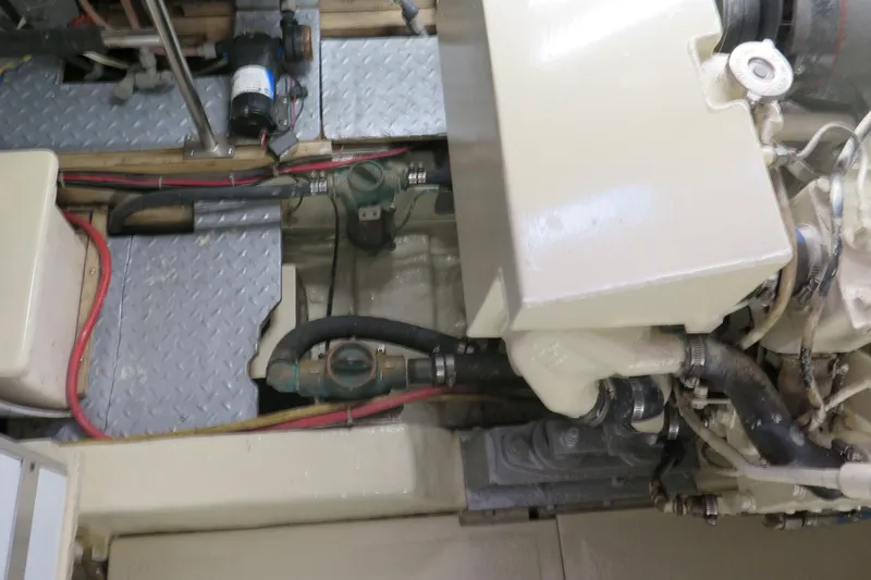 Slide: The Image of Engine room of 1987 Hershine Aftcabin Motoryacht with visible components and wiring. - 19