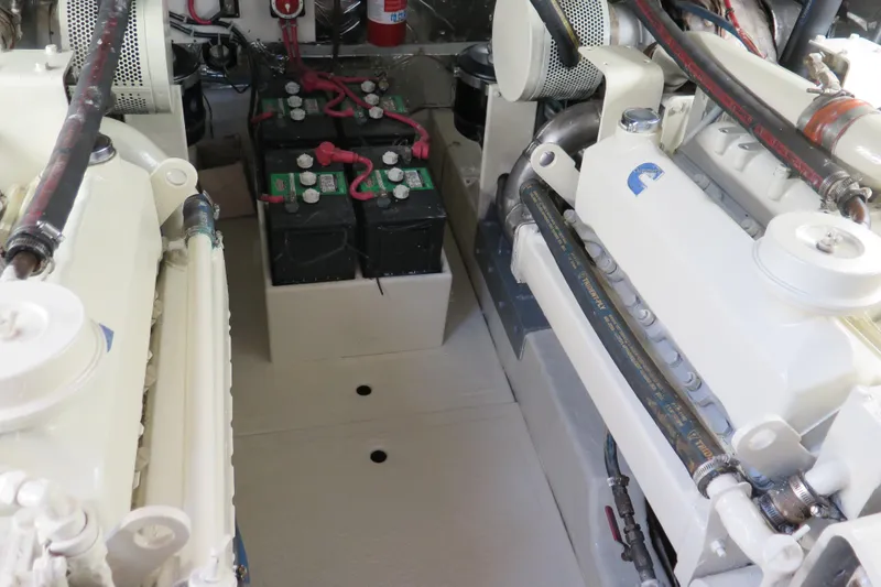 Slide: The Image of Engine room of 1987 Hershine Aftcabin Motoryacht with batteries and mechanical components. - 16