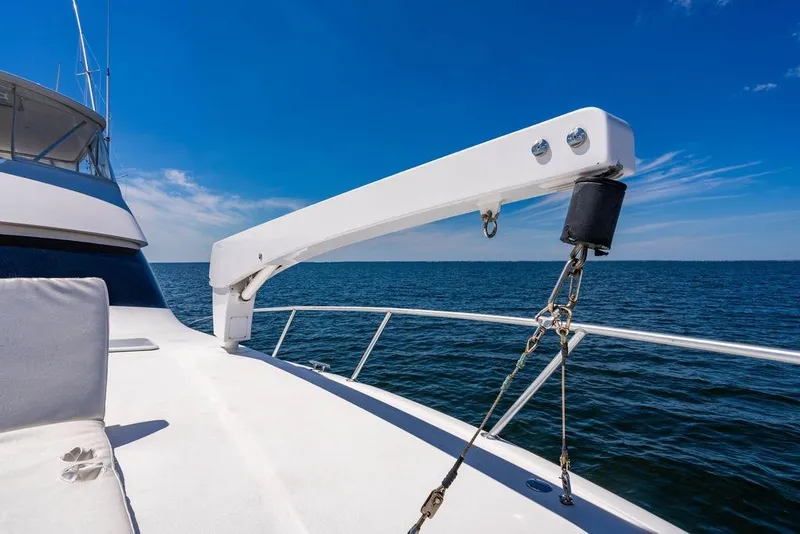 Slide: The Image of 2006 Viking 56 Convertible yacht deck with ocean view and clear blue sky. - 41