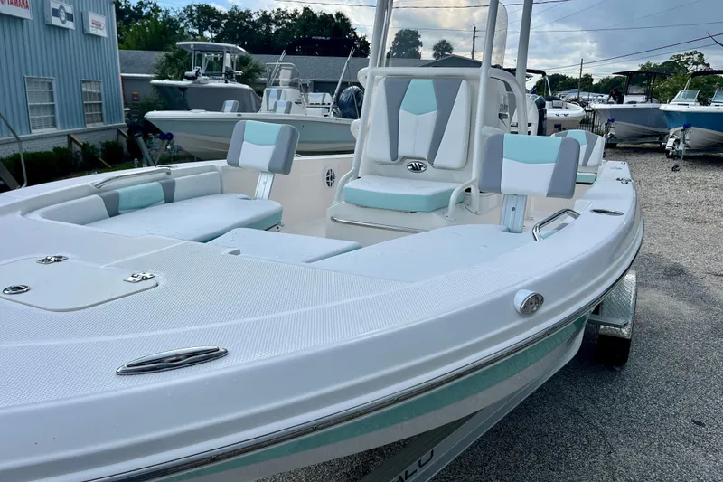 Slide: The Image of 2024 Robalo 206 Cayman boat with sleek design and comfortable seating. - 10