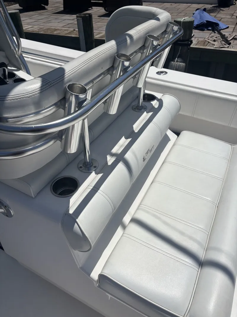 Slide: The Image of 2015 Contender 35 ST: White upholstery with stainless steel cup holders and backrest. - 6