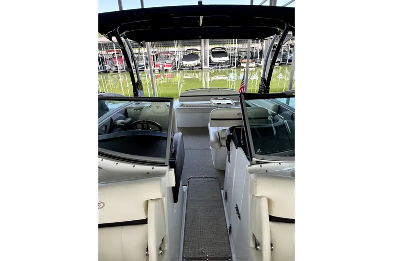 Slide: The Image of 2019 Cobalt R7 boat interior with white seating and sleek design. - 10