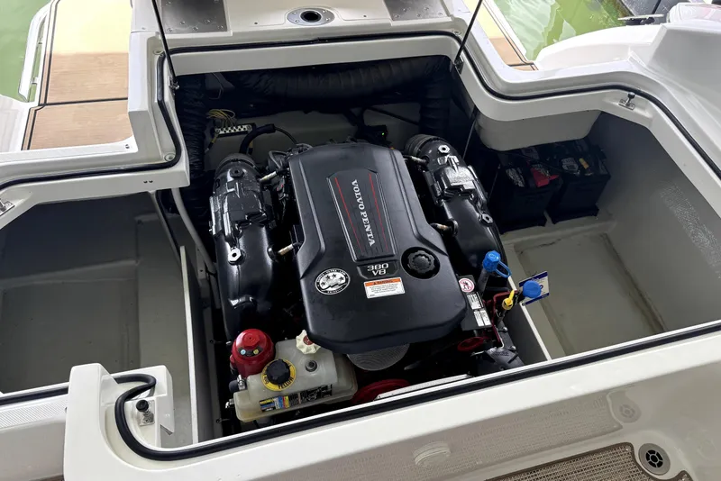 Slide: The Image of The engine compartment of a 2019 Cobalt R7 boat features a powerful engine with tidy wiring. - 13