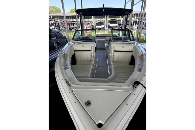 Slide: The Image of 2019 Cobalt R7 boat interior with white seating and open bow design. - 8
