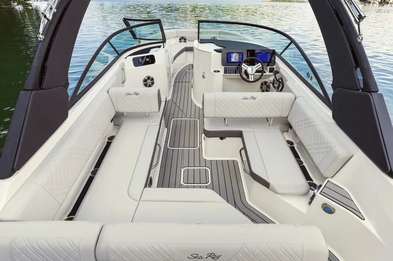 Slide: The Image of The image shows the spacious cockpit of a 2025 Sea Ray SDX 250 with elegant seating. - 36