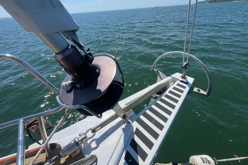 Slide: The Image of Bow of 2011 Beneteau Oceanis 54 sailboat on open water. - 9