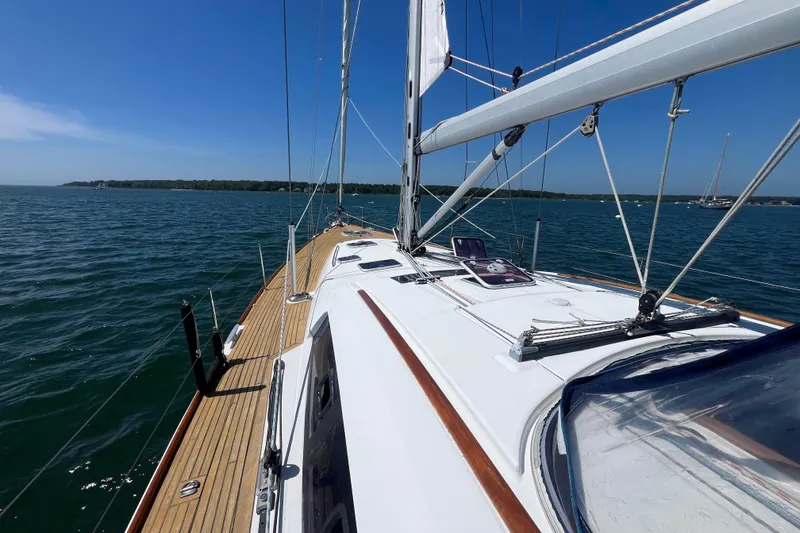 Slide: The Image of Sailing on a 2011 Beneteau Oceanis 54 yacht, clear blue waters, sunny day. - 4