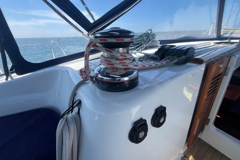 Slide: The Image of Winch and ropes on 2011 Beneteau Oceanis 54 sailboat deck, ocean view. - 17