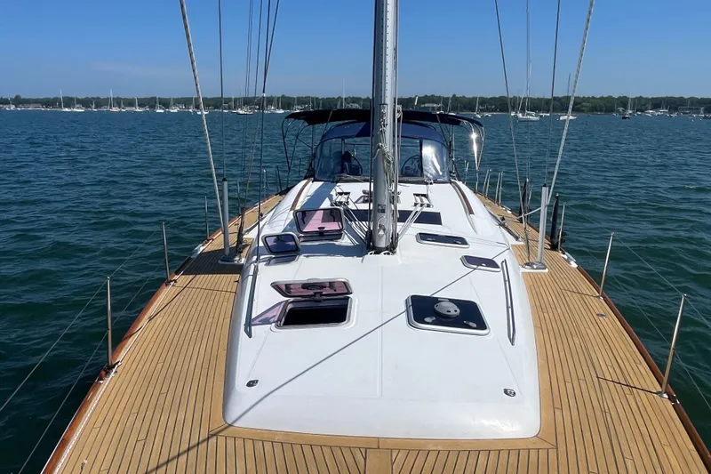 Slide: The Image of Sailing yacht Beneteau Oceanis 54, 2011 model, on calm waters with clear skies. - 5
