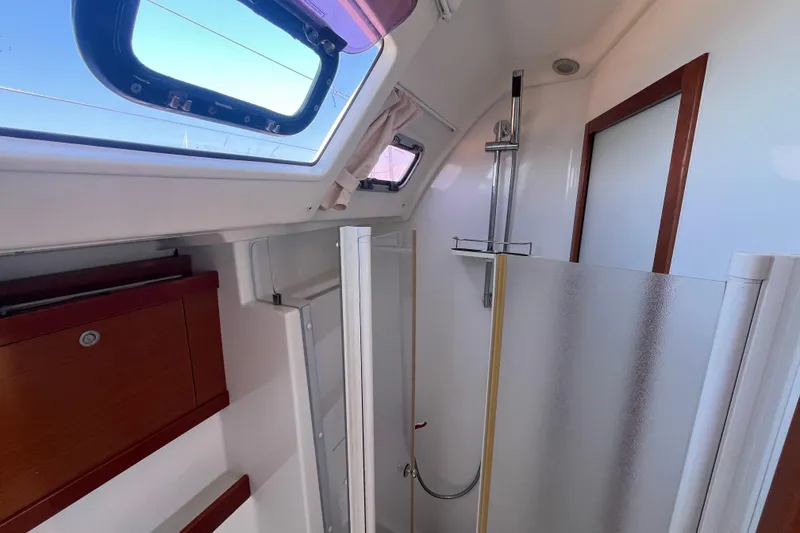 Slide: The Image of Interior view of 2011 Beneteau Oceanis 54 yacht bathroom with shower and skylight. - 40