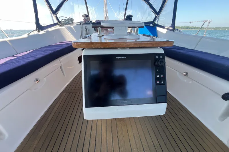 Slide: The Image of Cockpit of 2011 Beneteau Oceanis 54 with Raymarine navigation system. - 12
