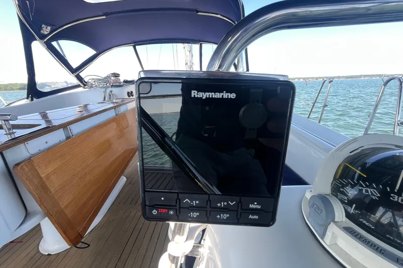 Slide: The Image of Raymarine navigation system on 2011 Beneteau Oceanis 54 yacht, with compass and cockpit view. - 14