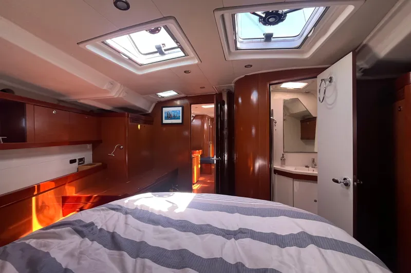 Slide: The Image of Luxurious interior of 2011 Beneteau Oceanis 54 yacht with wood finish and skylights. - 37