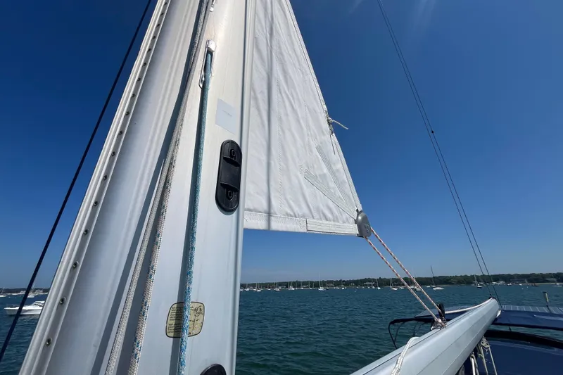Slide: The Image of Sailing on a 2011 Beneteau Oceanis 54 with clear blue skies and calm waters. - 45