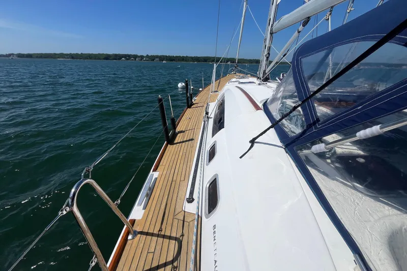 Slide: The Image of Sailing on a 2011 Beneteau Oceanis 54 yacht, clear skies, calm waters. - 19