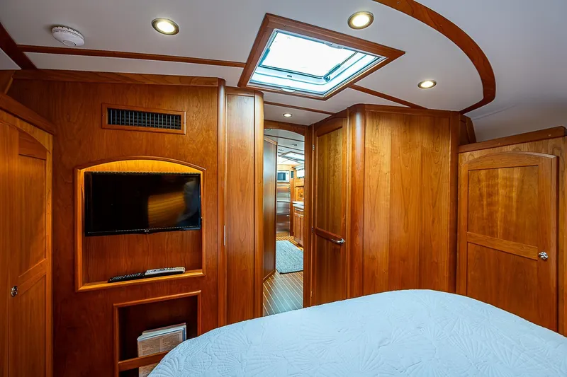 Slide: The Image of Luxurious interior of 2020 Sabre 48 Salon Express yacht with wood paneling and skylight. - 20
