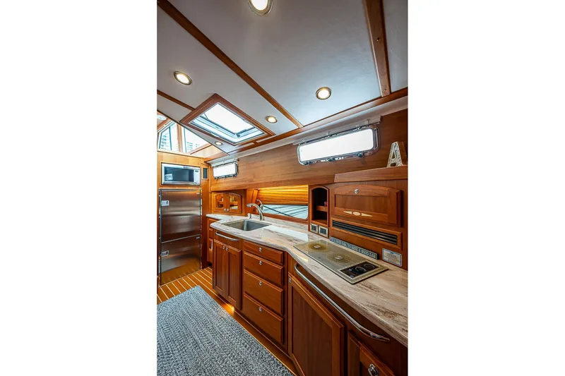 Slide: The Image of Luxurious interior of 2020 Sabre 48 Salon Express yacht with modern kitchen amenities. - 14