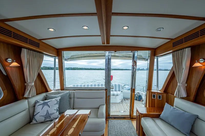 Slide: The Image of Luxurious interior of 2020 Sabre 48 Salon Express yacht with lake view. - 5