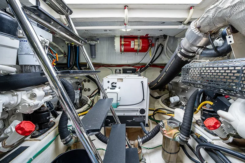 Slide: The Image of Engine room of 2020 Sabre 48 Salon Express, showcasing mechanical components and equipment. - 19