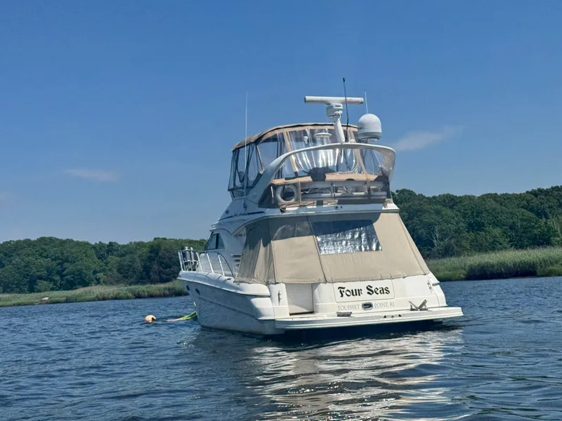 Slide: The Image of Sea Ray 400 Sedan Bridge 2001 on calm water - 2