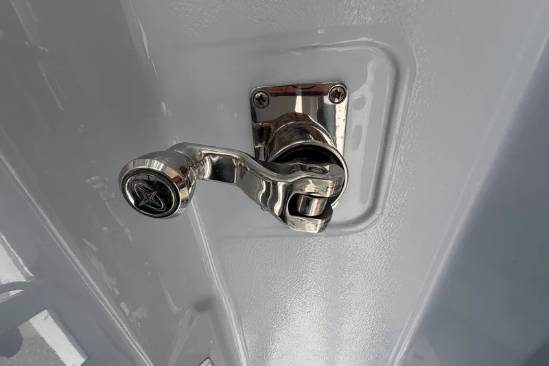 Slide: The Image of Chrome latch detail on 2023 Robalo R360 Center Console boat. - 18