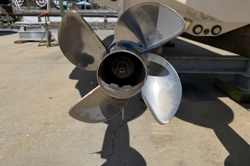 Slide: The Image of Close-up of a 2023 Robalo R360 Center Console boat propeller on a trailer. - 6