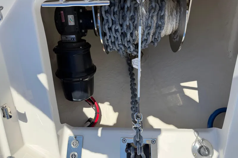 Slide: The Image of Anchor chain and winch system on 2023 Robalo R360 Center Console boat. - 40