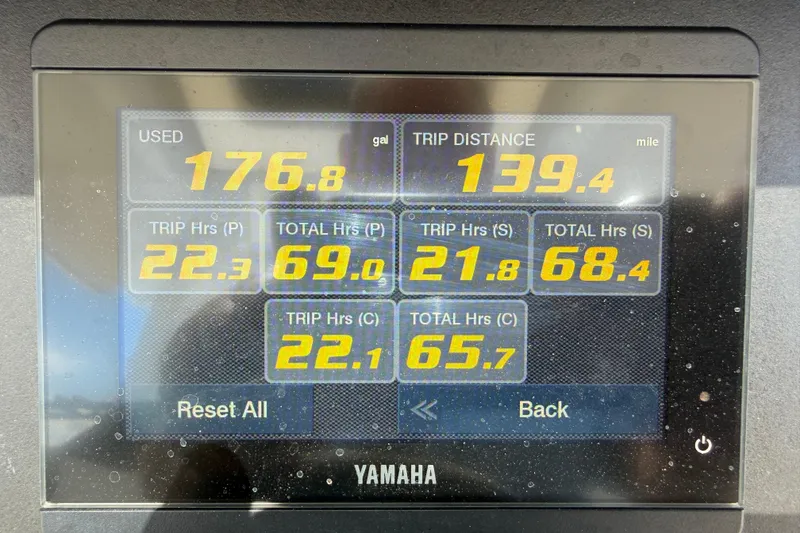 Slide: The Image of Display screen showing fuel usage and trip data for 2023 Robalo R360 Center Console. - 28
