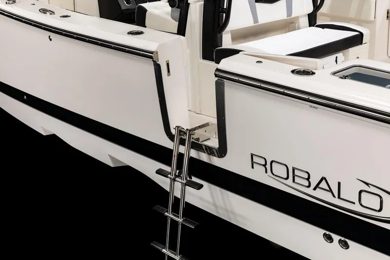 Slide: The Image of 2023 Robalo R360 Center Console boat with sleek design and ladder. - 49