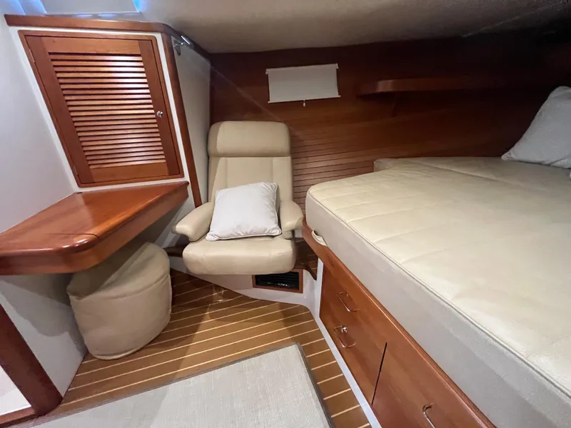 Slide: The Image of Luxurious cabin interior of 2016 MJM 50z yacht with wooden finishes and comfortable seating. - 20