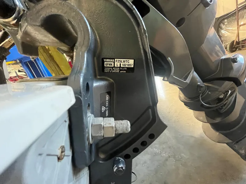 Slide: The Image of Close-up of a Yamaha F25LWTC engine mount on a 2016 MJM 50z boat. - 34