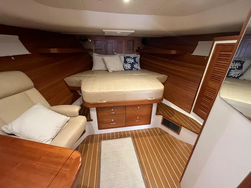 Slide: The Image of Luxurious 2016 MJM 50z yacht cabin with wood finish and cozy bedding. - 21
