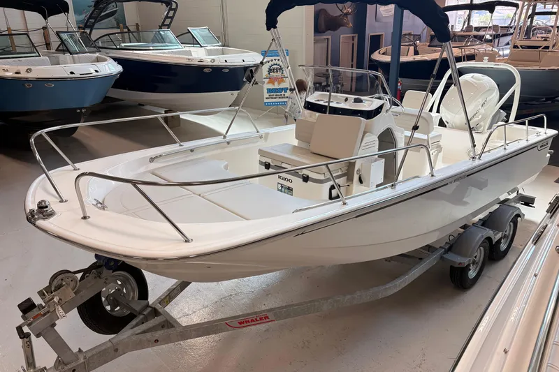 The Image of 2026 Boston Whaler 190 Montauk boat on trailer in showroom. - 1