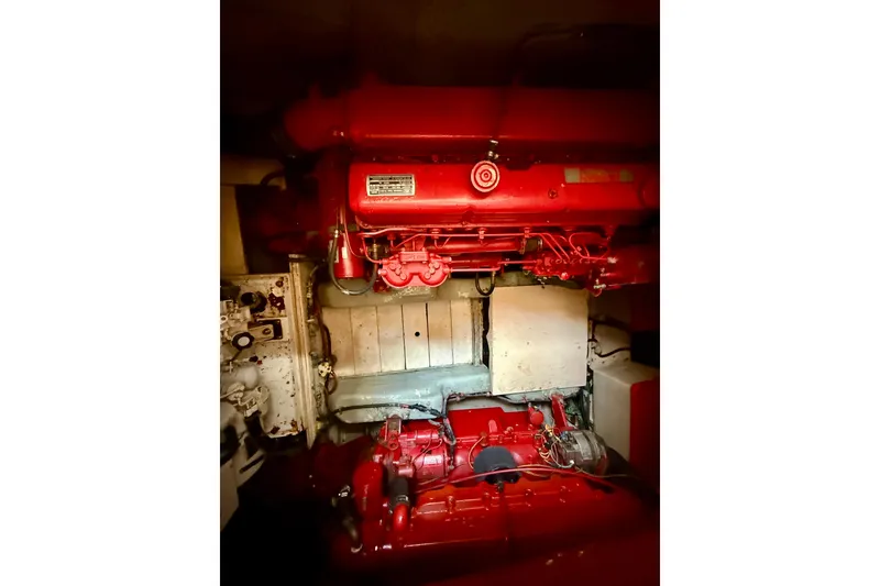 Slide: The Image of Engine room of 1981 Kha Shing Sundeck ACMY with red machinery components. - 53