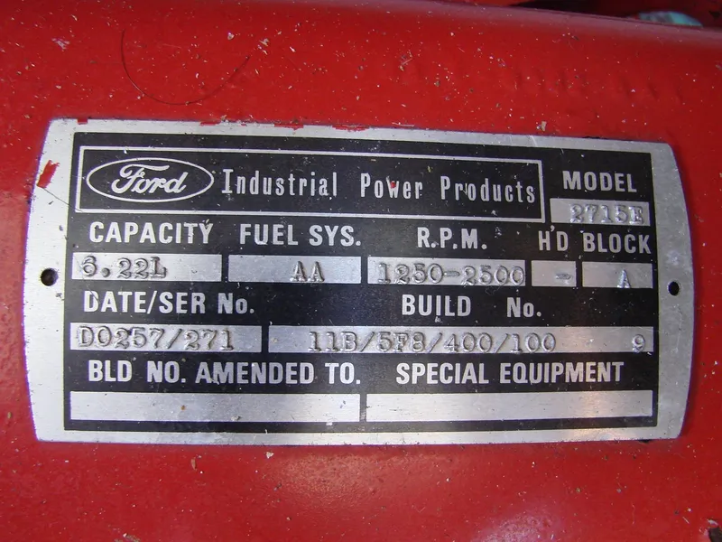 Slide: The Image of Ford industrial engine plate with technical specifications. - 36